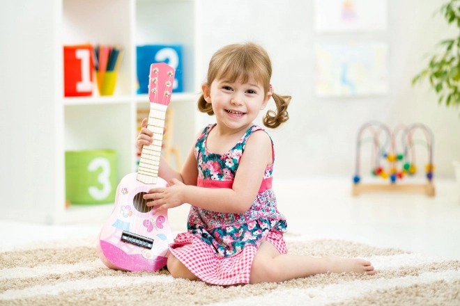Kindergitarre aus Holz mit Metall-Saiten in Pink