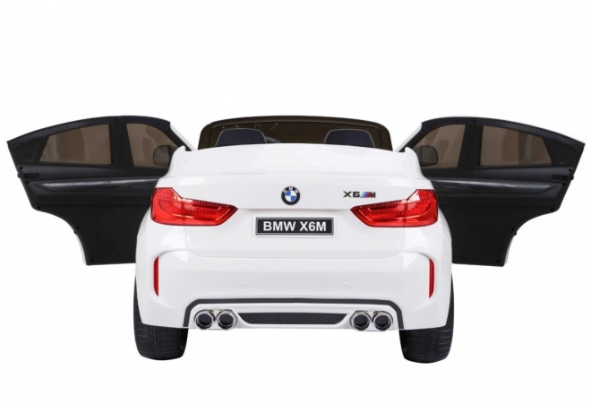 BMW X6M XXL pro 2 Kinder Weiß + Fernsteuerung + Eco-Leder + Sicherheitsgurte + langsamer Start + MP3 USB + LED