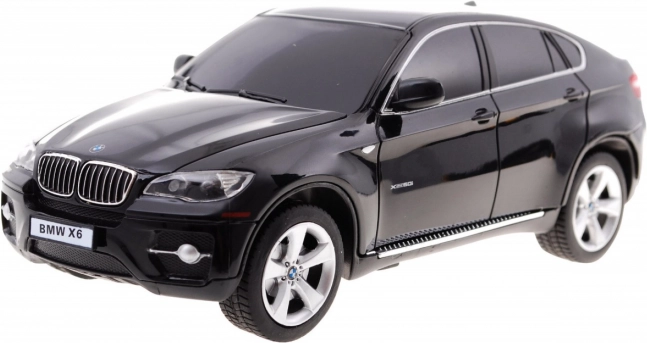 BMW X6 schwarz RASTAR Modell 1:24 SUV mit Fernsteuerung + Fernsteuerung