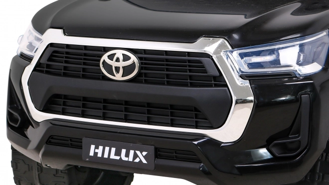 Toyota Hilux Batterie für Kinder schwarz + Antrieb 4x4 + Fernbedienung + 2 Gepäckträger + MP3-Radio + LED-Diode