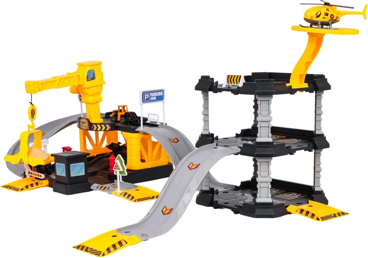 Hubschrauberlandeplatz und Baufahrzeuge