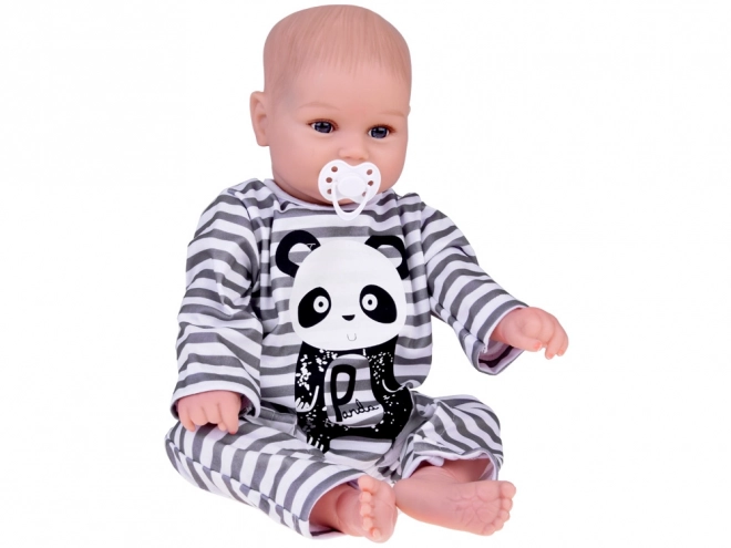 Niedliche weiche Babypuppe Junge mit Panda-Strampler