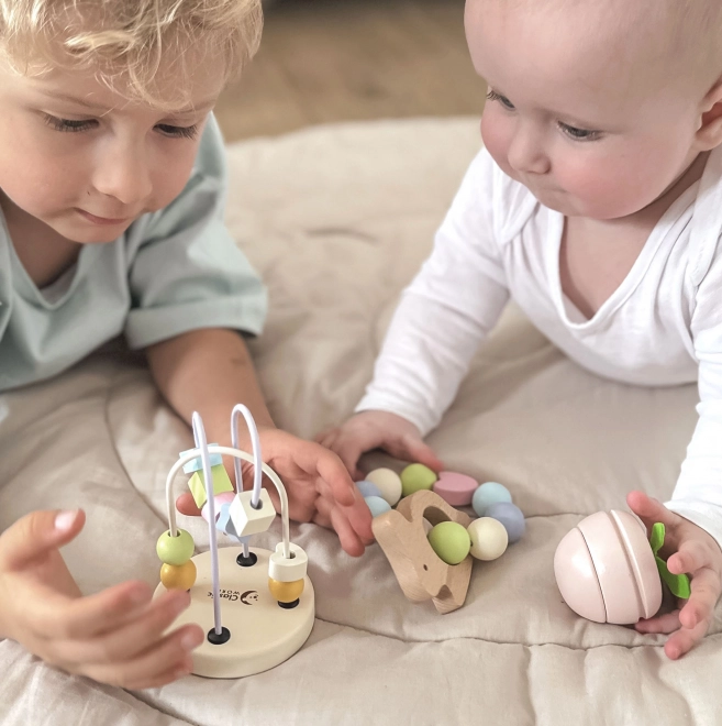 Pastellfarbener Motorikspielzeug-Satz für Babys von Geburt an