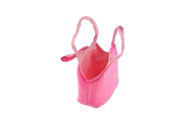 Hündchen in rosa Plüsch-Handtasche