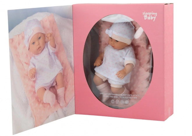 Baby Puppe mit Schlafanzug und Accessoires