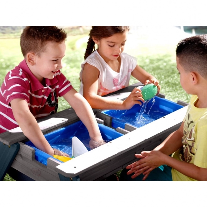 Axi Picknicktisch Nick mit Sand-/Wasserbehältern und Sonnenschirm