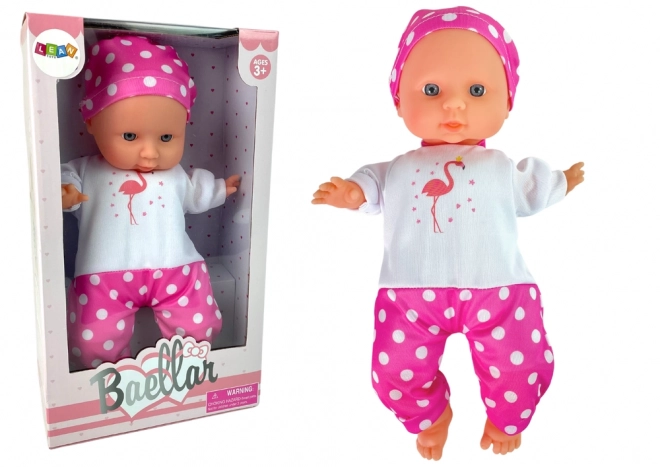 Baby-Puppe rosa Pyjama mit Punkten 30 cm