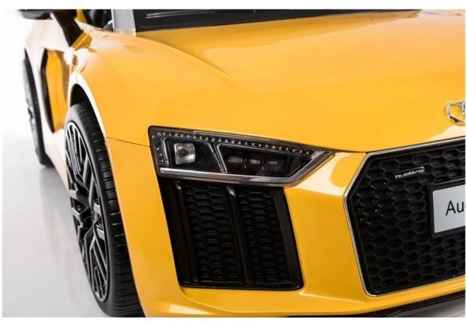 Gelbes Elektroauto AUDI R8 Spyder für Kinder