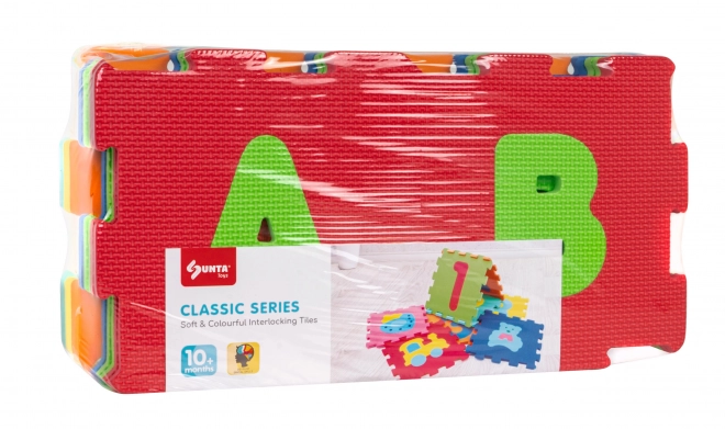 Bunte Schaumstoffmatte mit Buchstaben und Zahlen für Kleinkinder