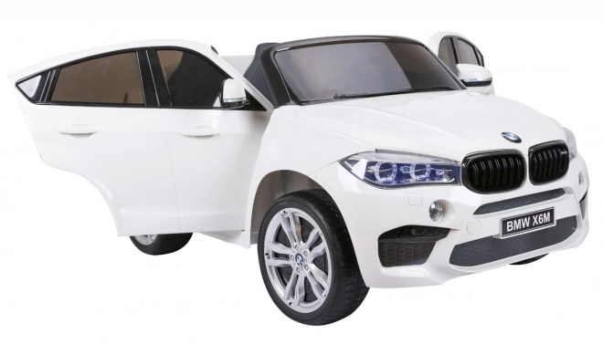 BMW X6M XXL pro 2 Kinder Weiß + Fernsteuerung + Eco-Leder + Sicherheitsgurte + langsamer Start + MP3 USB + LED