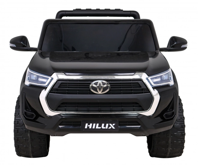 Toyota Hilux Batterie für Kinder schwarz + Antrieb 4x4 + Fernbedienung + 2 Gepäckträger + MP3-Radio + LED-Diode