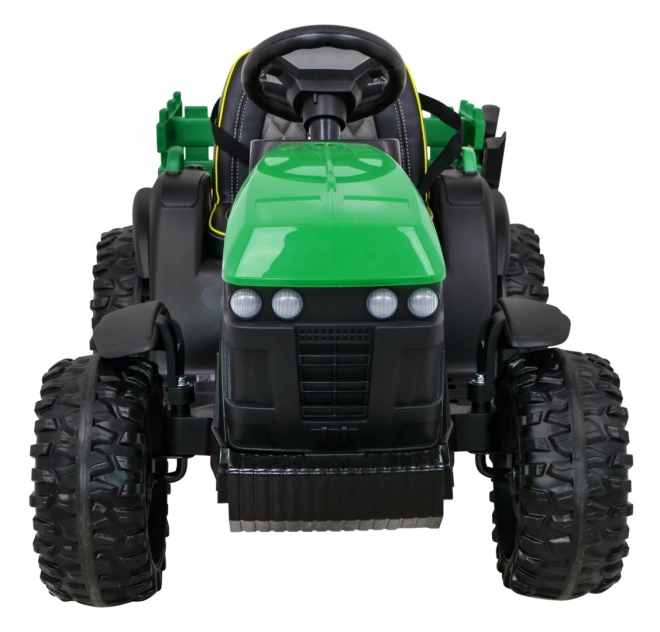 Titantraktor mit Anhänger grün