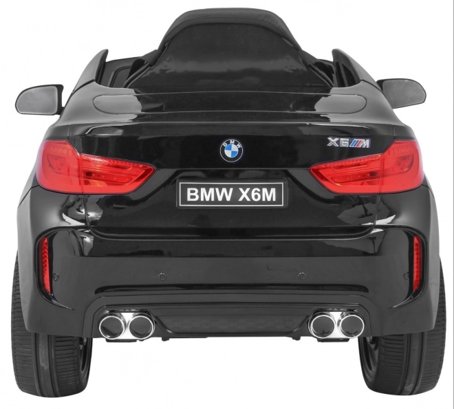 BMW X6M Elektrisches Kinderauto Schwarz + Fernbedienung + EVA + Langsamer Start + Audiopanel + LED-Diode