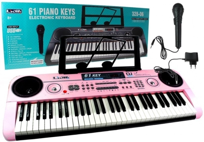 Moderner Keyboard mit Mikrofon und Netzteil in Pink