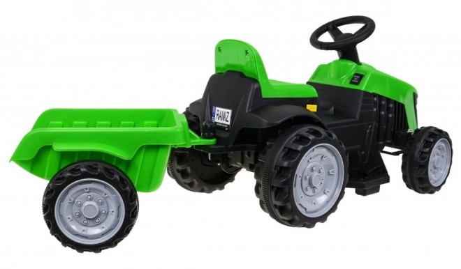 Grüner Traktor mit Anhänger