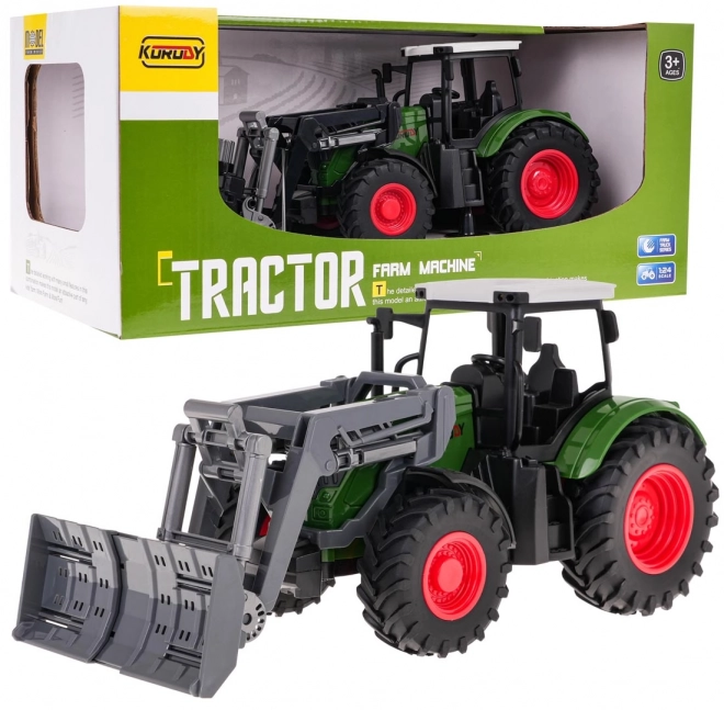 Grüner Traktor mit Schaufel