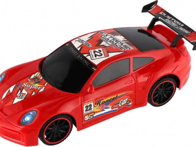 Sportliches Plastikauto mit Schwungrad 30 cm