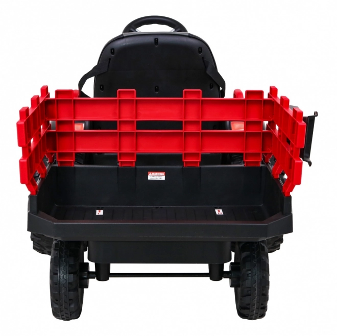 Titan-Traktor mit rotem Anhänger