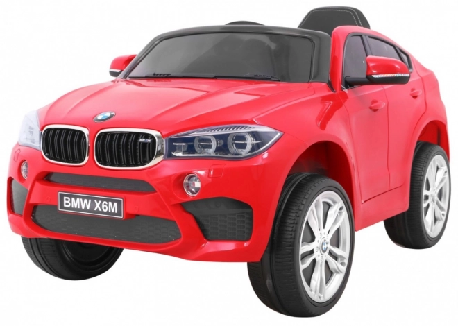BMW X6M Elektrisches Kinderauto Rot + Fernbedienung + EVA + langsamer Start + Audiopanel + LED-Diode