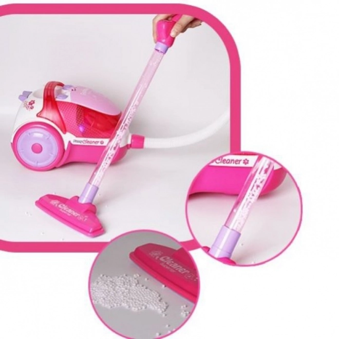 Kinderstaubsauger mit Saugfunktion in Rosa
