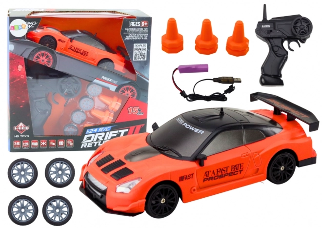Ferngesteuertes Sportauto mit Wechselrädern in Orange