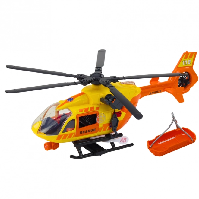 Rettungshubschrauber mit Haken und Trage, Licht & Sound, orange 1:12