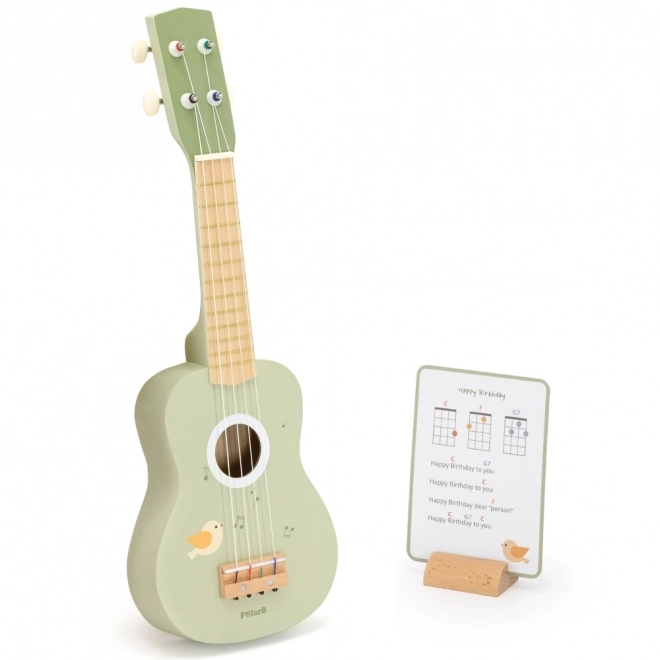 Grüne Ukulele aus Holz für Kinder mit Noten