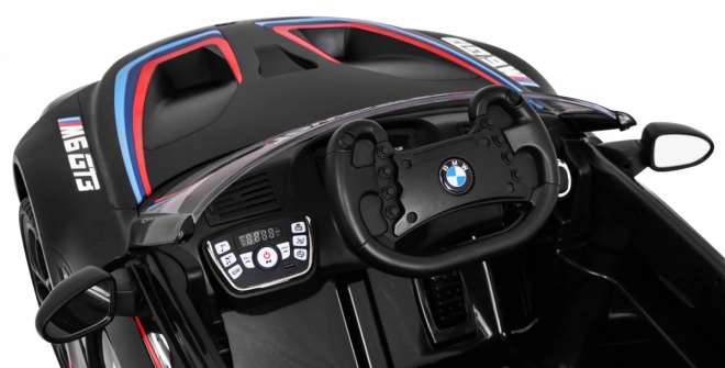 BMW M6 GT3 Spielzeugauto auf Batterie für Kinder schwarz + Belüftung + MP3-Sounds Lichter + Fernbedienung