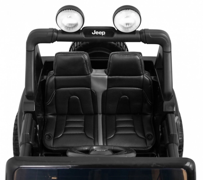 Jeep Wrangler Rubicon Batterie für Kinder schwarz + Fernbedienung + MP3 LED Radio + EVA Räder