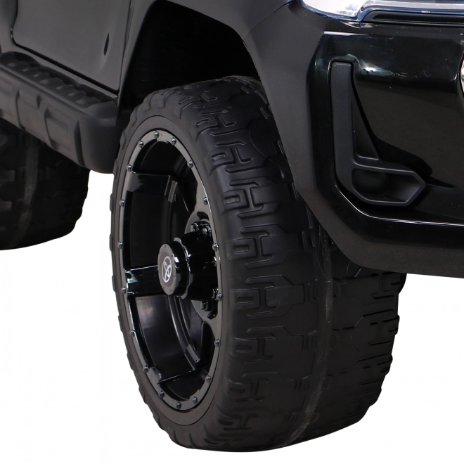 Toyota Hilux Batterie für Kinder schwarz + Antrieb 4x4 + Fernbedienung + 2 Gepäckträger + MP3-Radio + LED-Diode