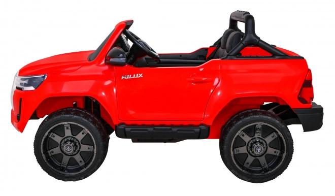 Toyota Hilux Batterie Kinderauto Rot + Allradantrieb 4x4 + Fernbedienung + 2 Gepäckträger + MP3-Radio + LED-Diode