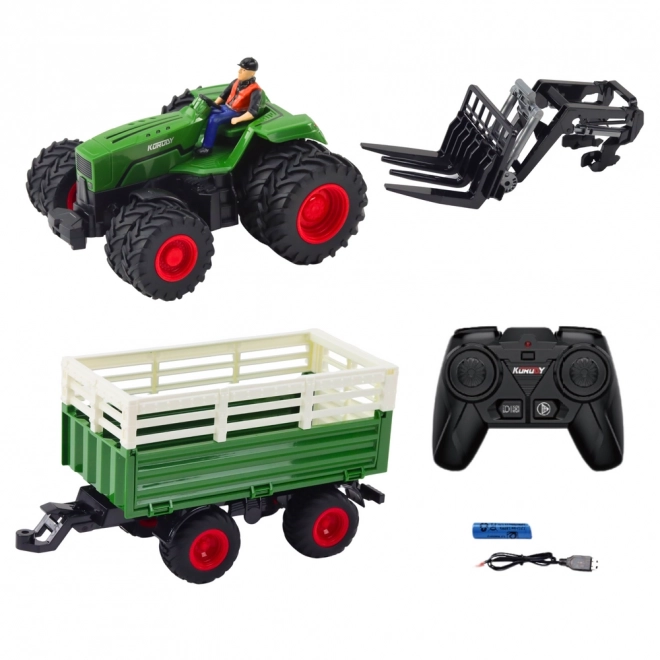 Ferngesteuerter Traktor mit Anhänger und Gabeln