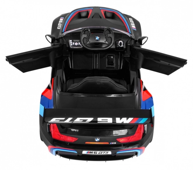 BMW M6 GT3 Spielzeugauto auf Batterie für Kinder schwarz + Belüftung + MP3-Sounds Lichter + Fernbedienung