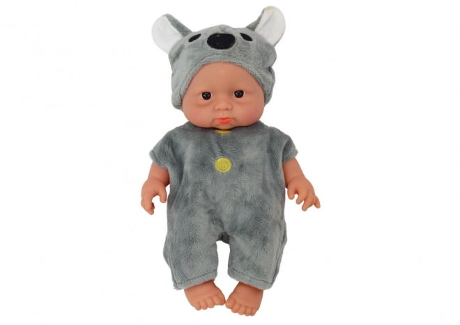 Niedliches Babypuppe mit Koala Mütze