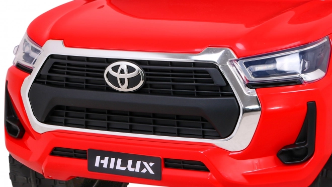 Toyota Hilux Batterie Kinderauto Rot + Allradantrieb 4x4 + Fernbedienung + 2 Gepäckträger + MP3-Radio + LED-Diode