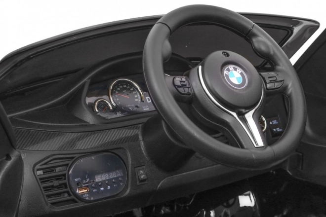BMW X6M Elektrisches Kinderauto Schwarz + Fernbedienung + EVA + Langsamer Start + Audiopanel + LED-Diode