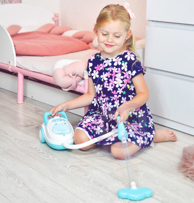 Interaktiver Kinderstaubsauger mit Saugfunktion Woopie