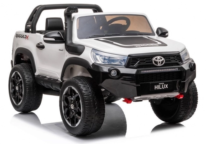 Elektrisches Kinderauto Toyota Hilux in Weiß