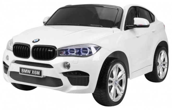BMW X6M XXL pro 2 Kinder Weiß + Fernsteuerung + Eco-Leder + Sicherheitsgurte + langsamer Start + MP3 USB + LED