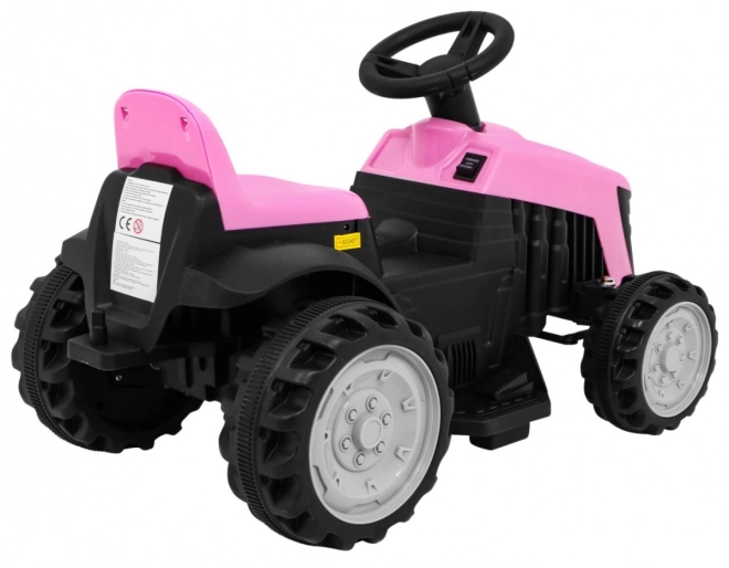 Grüner Traktor mit Anhänger – rosa