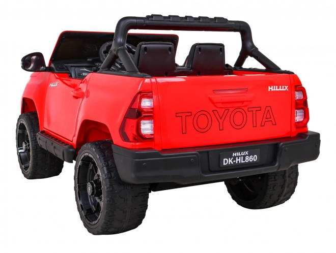 Toyota Hilux Batterie Kinderauto Rot + Allradantrieb 4x4 + Fernbedienung + 2 Gepäckträger + MP3-Radio + LED-Diode