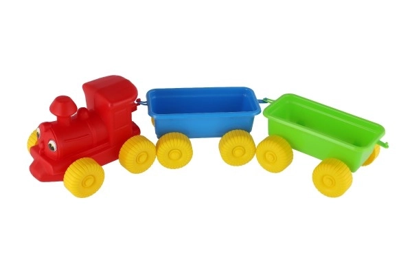 Plastikspielzeugzug mit 2 Waggons