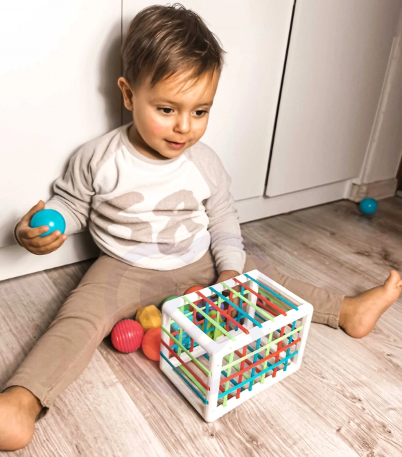 Bunte flexible WOOPIE Baby Sensorik-Würfel mit Formen-Sortierer