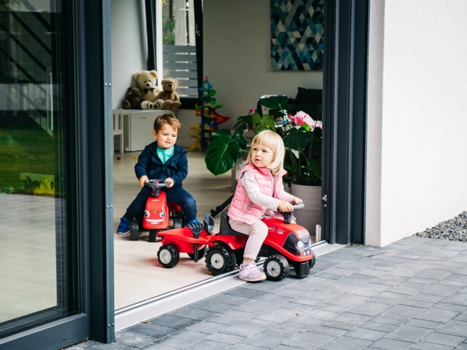 Falk Kinderrutscher Traktor mit Anhänger und Gartenwerkzeugen