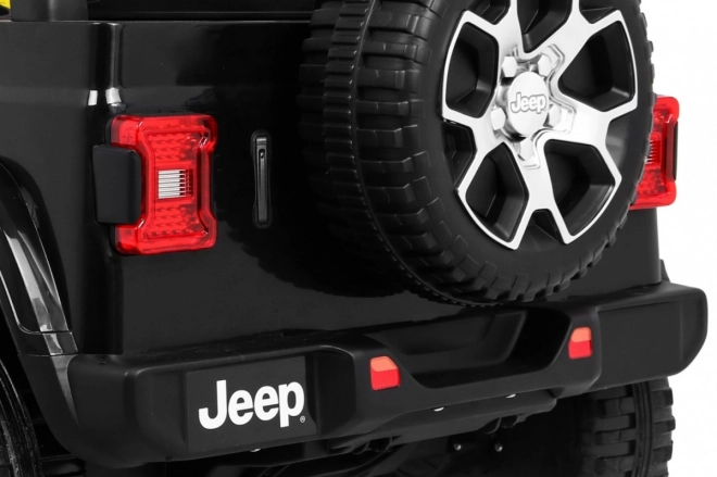 Jeep Wrangler Rubicon Batterie für Kinder schwarz + Fernbedienung + MP3 LED Radio + EVA Räder