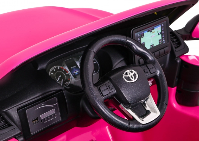 Toyota Hilux auf Batterie für Kinder Rosa + Antrieb 4x4 + Fernbedienung + 2 Sitzplätze + MP3 Radio + LED