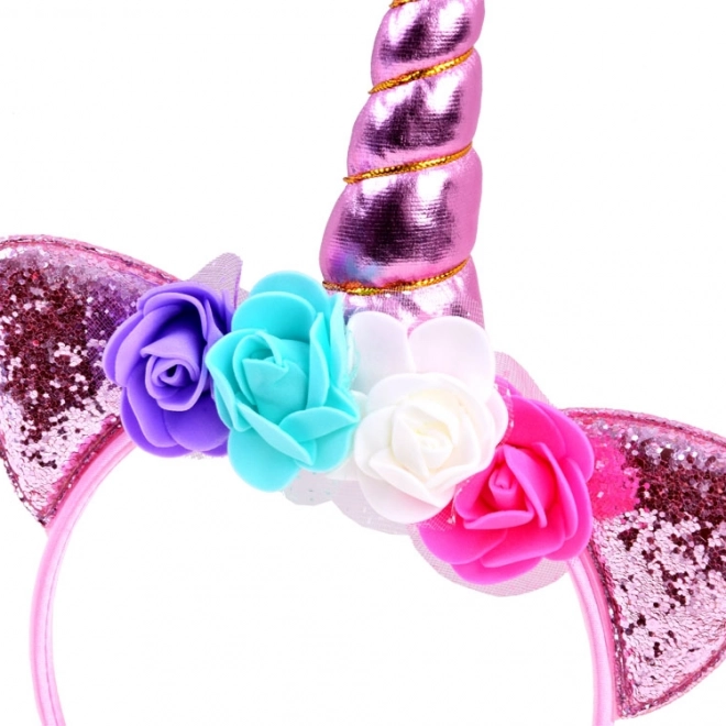 Glitzerndes Horn und florale Verzierung