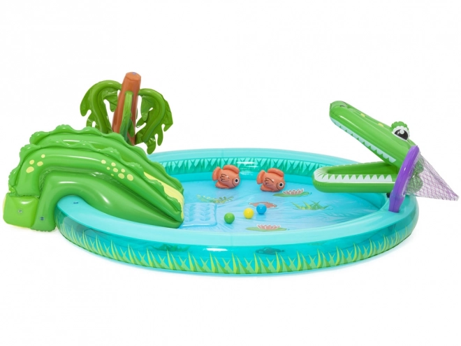 Drachen-Spielplatz mit Rutsche und Sprinkler