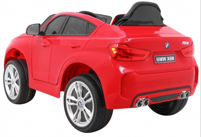 BMW X6M Elektrisches Kinderauto Rot + Fernbedienung + EVA + langsamer Start + Audiopanel + LED-Diode