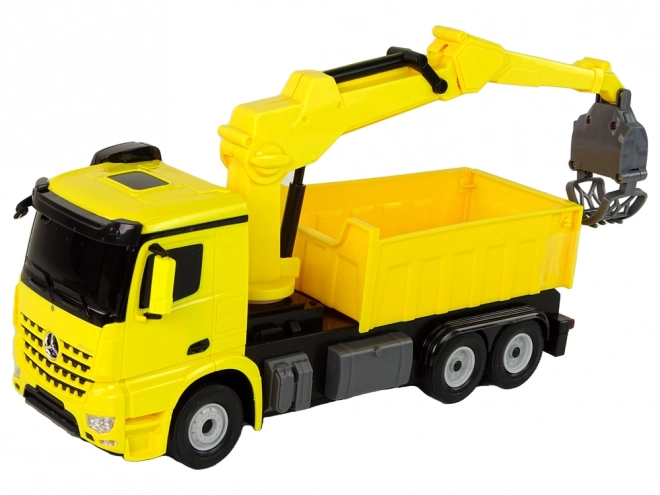 Mercedes Greifer-LKW von Rastar Gelb